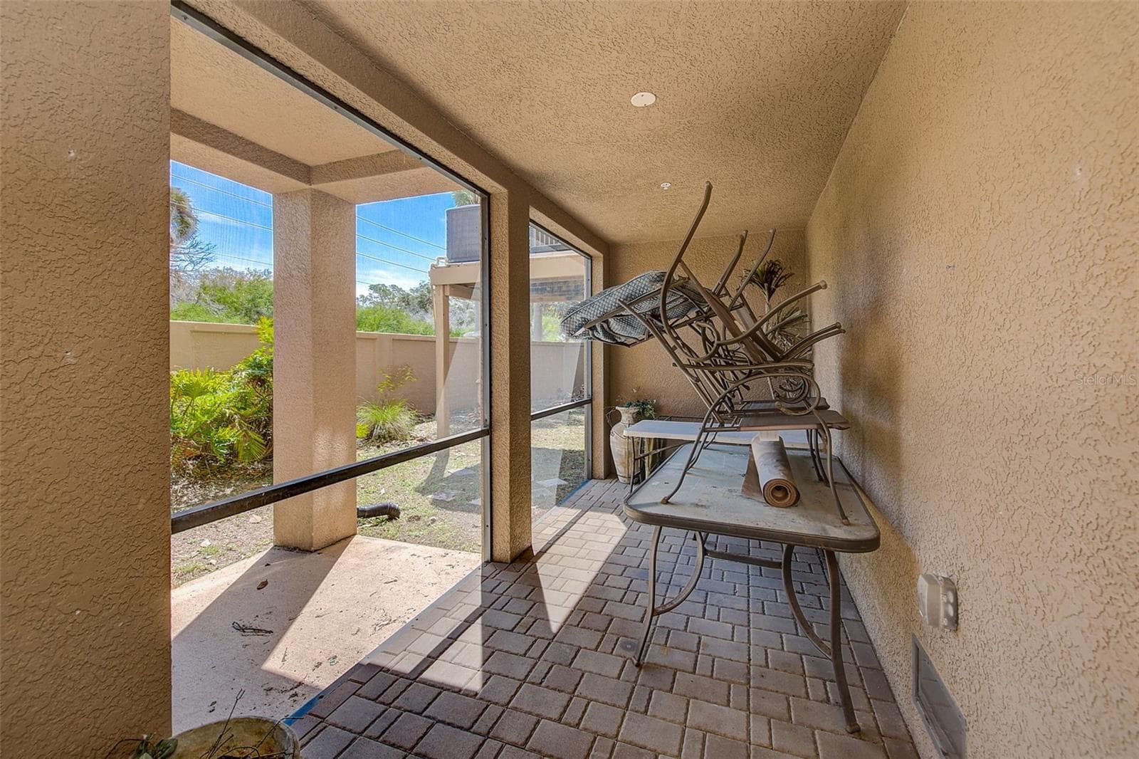 1ST LEVEL COVERED PATIO & SCREEN LANAI - 6518 SAND SHORE LN, NEW PORT RICHEY