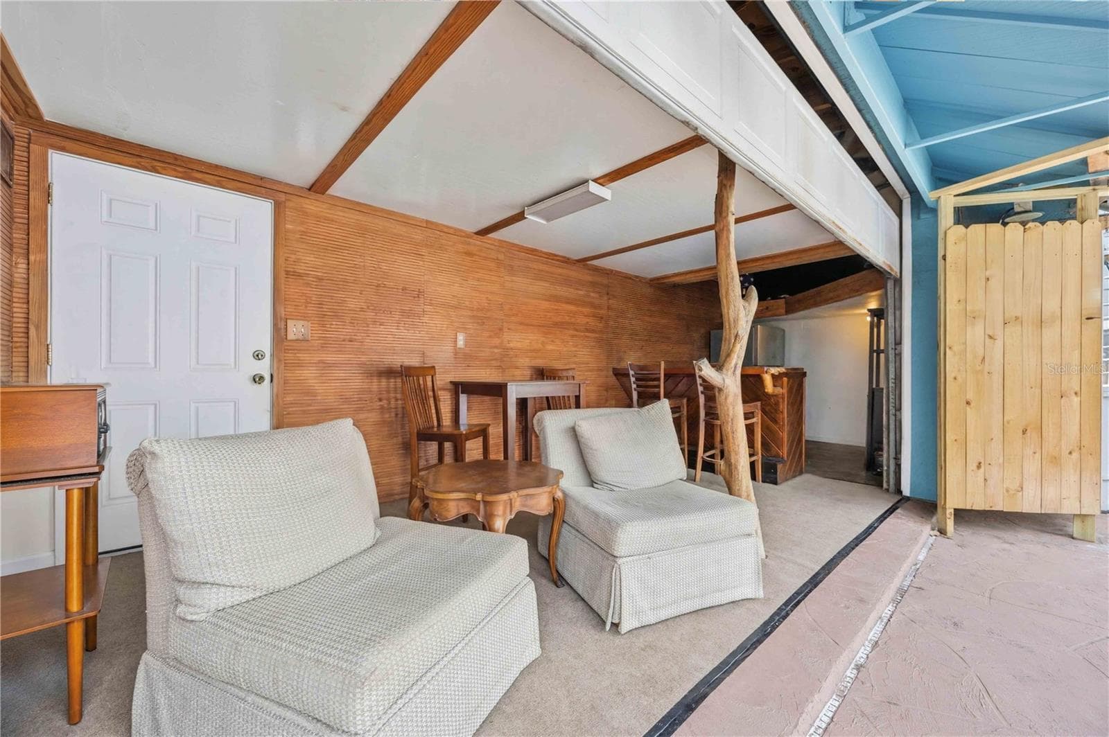 Bar area off the lanai features an overhead door that locks for added security. - 6649 PIMLICO ST, NORTH PORT