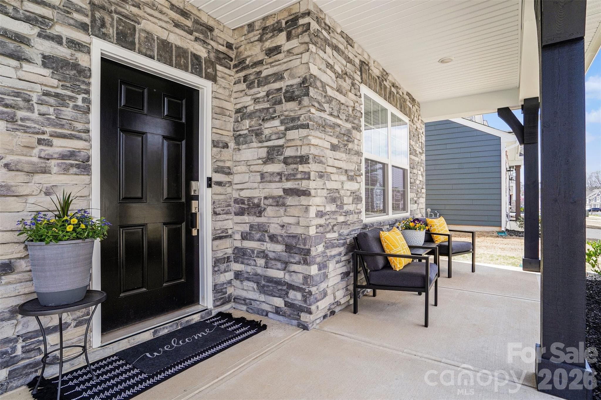 Oversized covered porch - 310 Hamptons Cove Road, Troutman