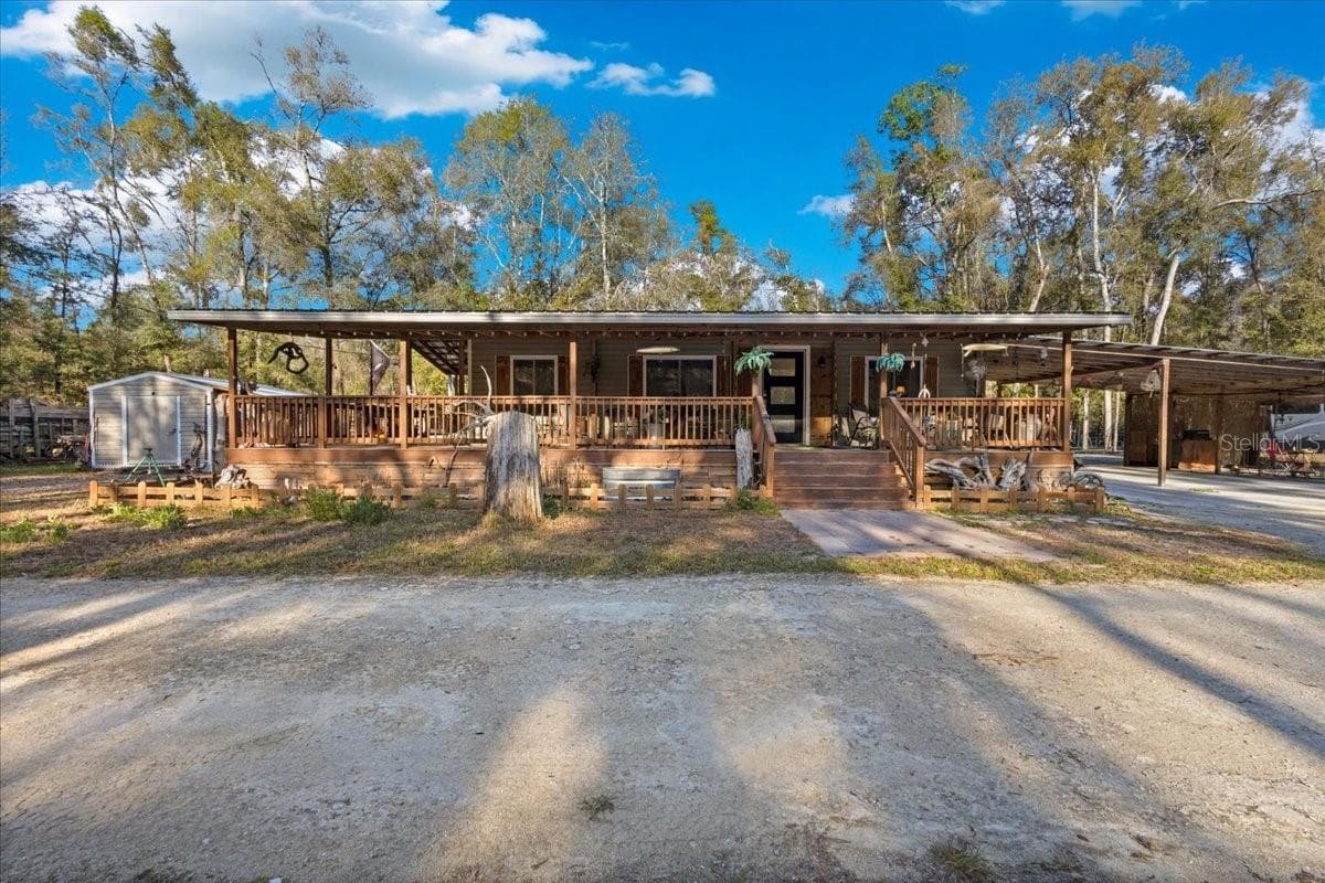 Manufactured Home at 5850 NW 50TH ST, BELL, photo 3 of 44