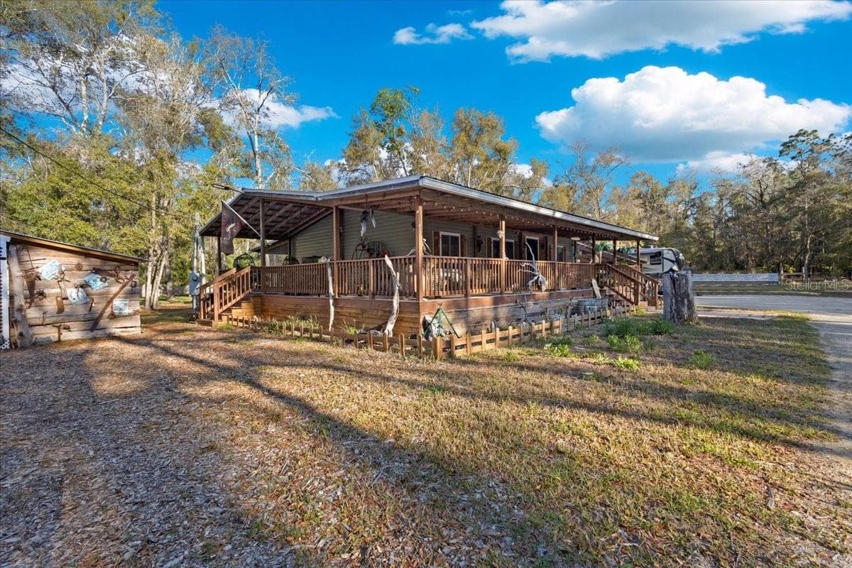 Manufactured Home at 5850 NW 50TH ST, BELL, photo 5 of 44