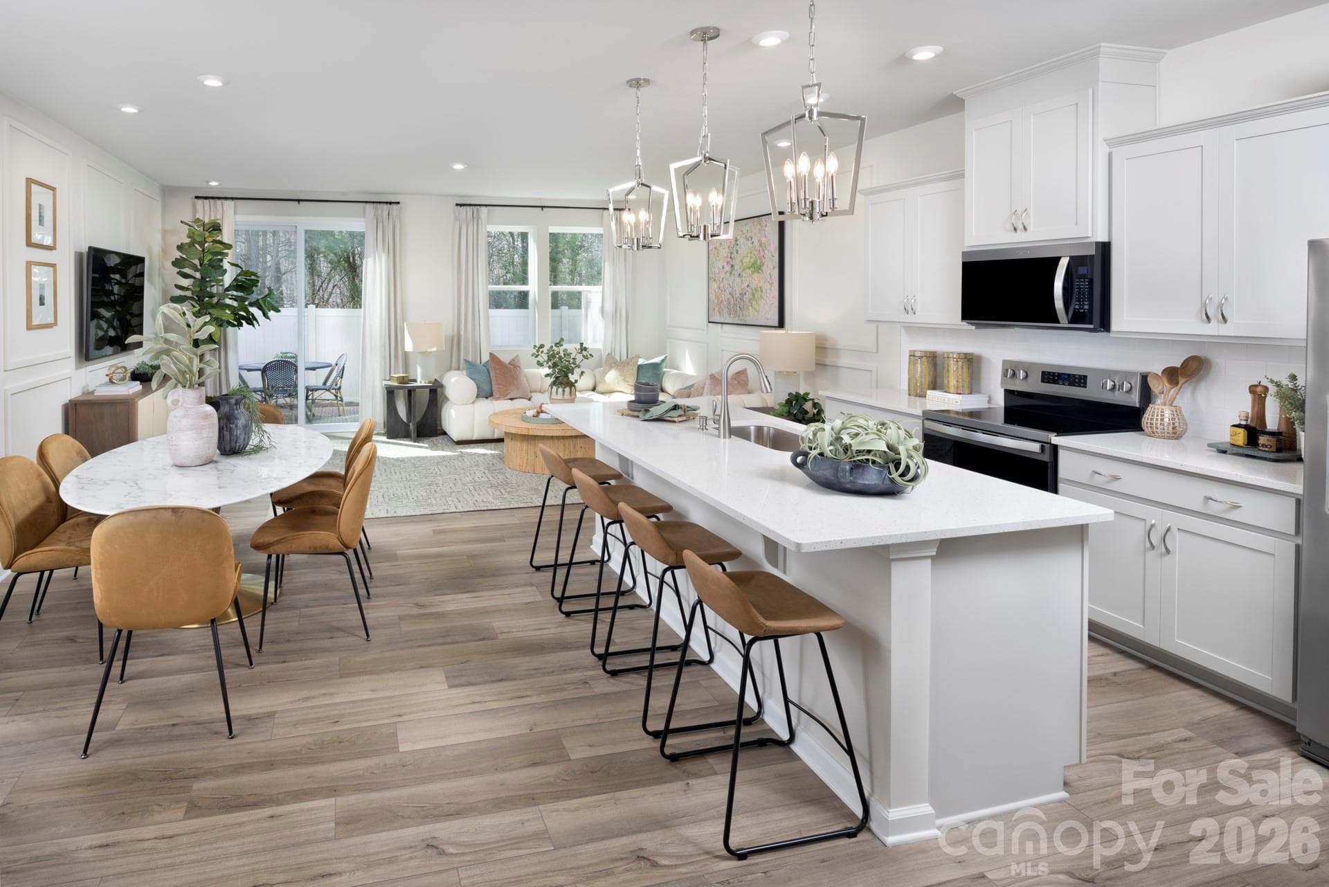 Photos shown are of a staged model home and are for illustrative purposes only. Floor plan is the same; however, finishes, colors, features, fixtures, furnishings, and design selections may vary from the actual home. - Charlotte