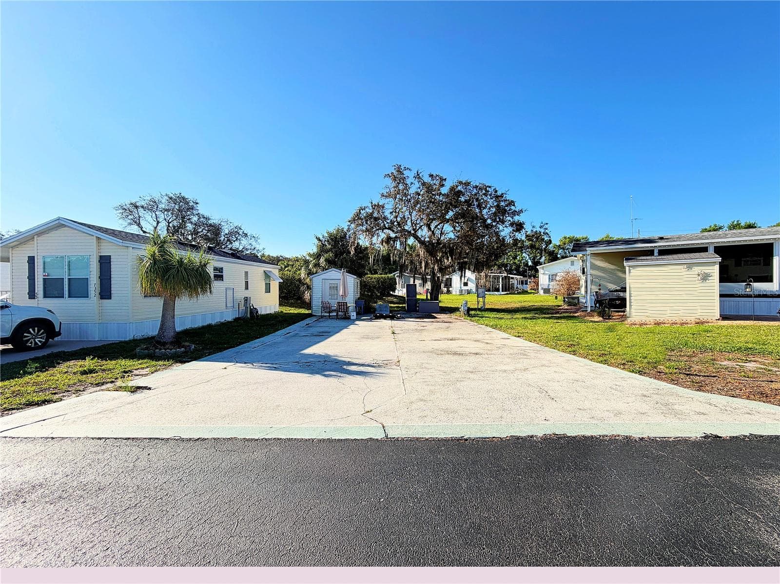 60x40 lot paved lot with storage shed - 7350 MIDWAY LN #54, LAKE WALES