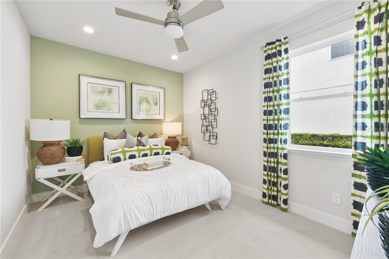 Private ensuite retreat with a spacious walk-in closet and a sleek walk-in shower in soothing finishes. - 2418 PARK RIDGE ST, APOPKA