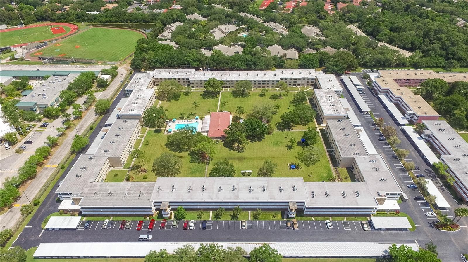 A desirable feature is the large courtyard with green space, shuffleboard, recreation center, and more. - 5095 BAY ST NE #110, ST PETERSBURG