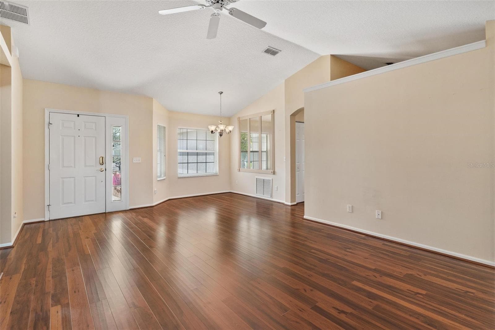 Interior entry greets you with high ceilings, engineered wood flooring overlooking the dining and Living Rooms - 11614 SE 172ND LOOP, SUMMERFIELD