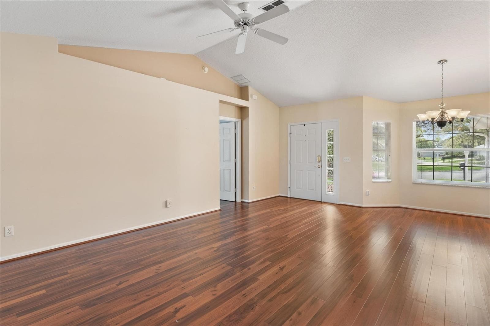 Interior entry greets you with high ceilings, engineered wood flooring overlooking the dining and Living Rooms - 11614 SE 172ND LOOP, SUMMERFIELD