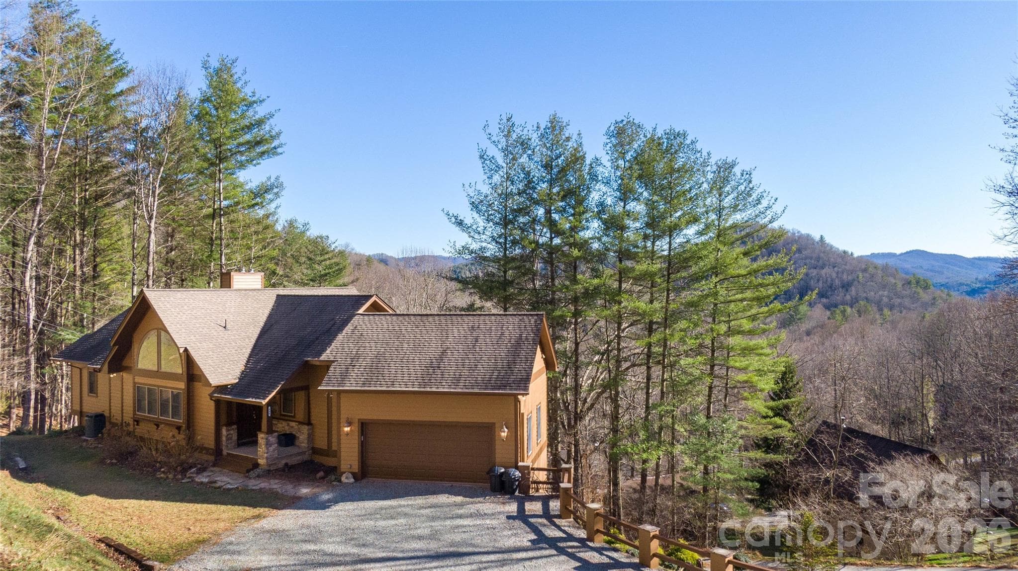 Front entrance to home has covered entry and parking area for 4 vehicles on the drive. - 446 Windridge Drive, Sugar Grove