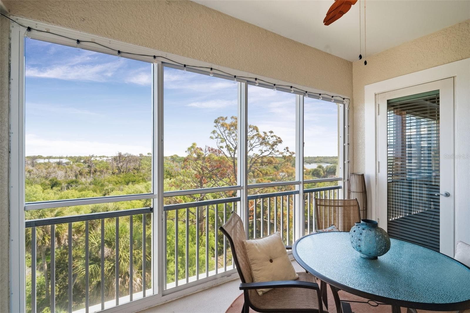 Enclosed Patio with Acrylic Sliders - 8561 AMBERJACK CIR #302, ENGLEWOOD