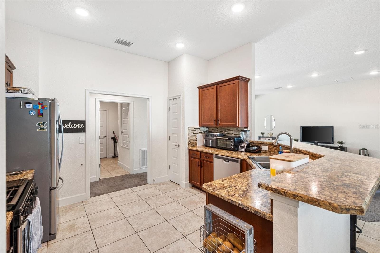 Single Family Residence at 9778 PEPPER TREE PL, WILDWOOD, photo 16 of 47