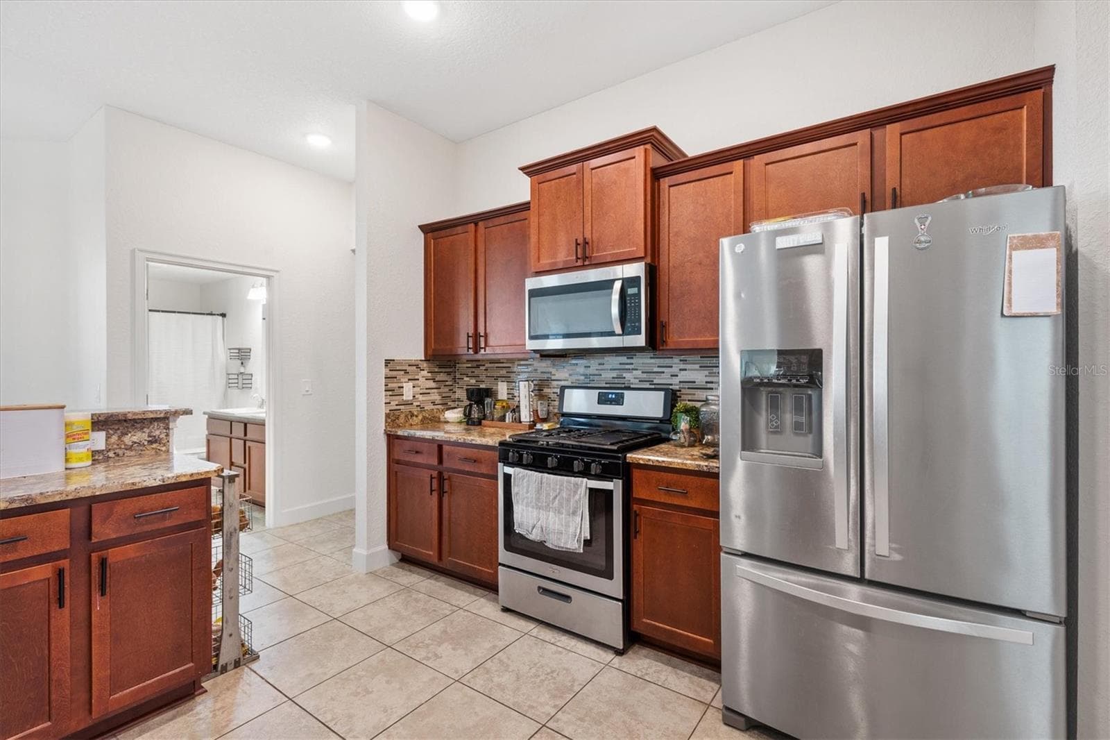Single Family Residence at 9778 PEPPER TREE PL, WILDWOOD, photo 18 of 47