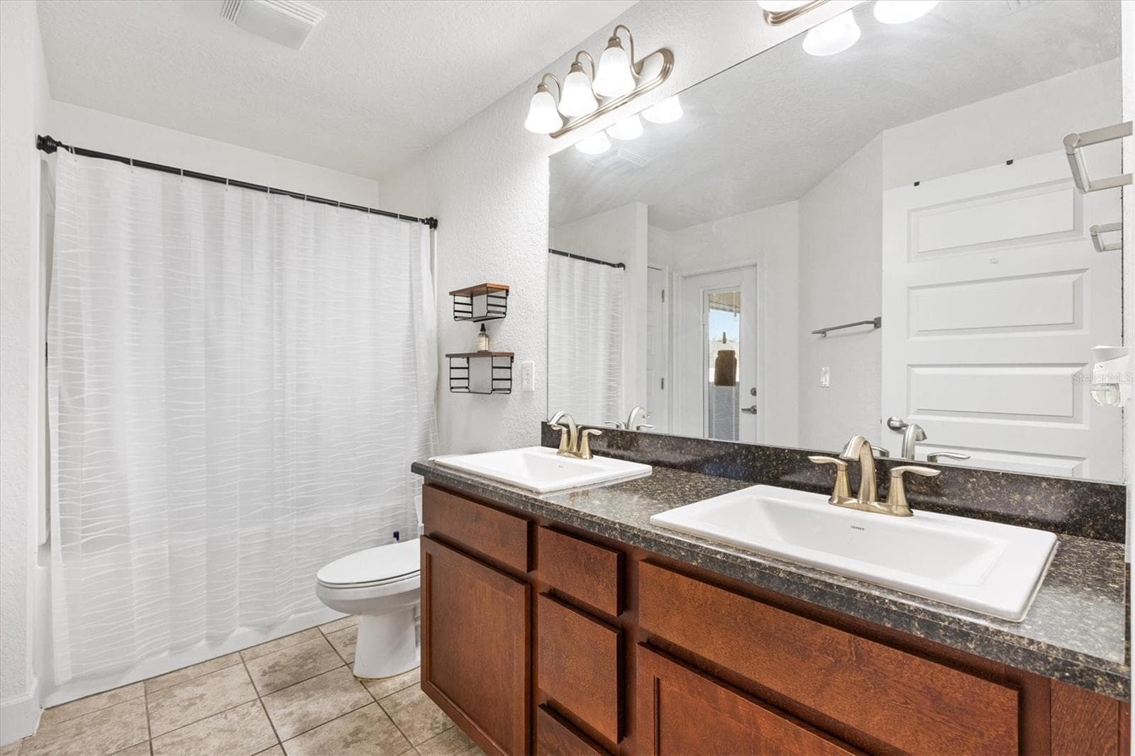 Single Family Residence at 9778 PEPPER TREE PL, WILDWOOD, photo 19 of 47