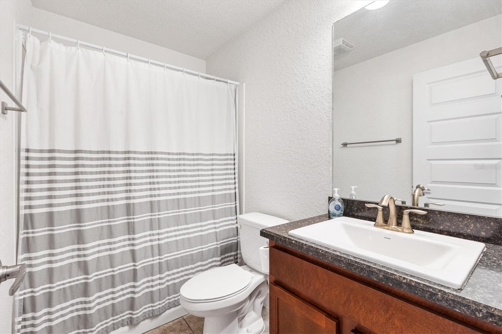 Single Family Residence at 9778 PEPPER TREE PL, WILDWOOD, photo 31 of 47
