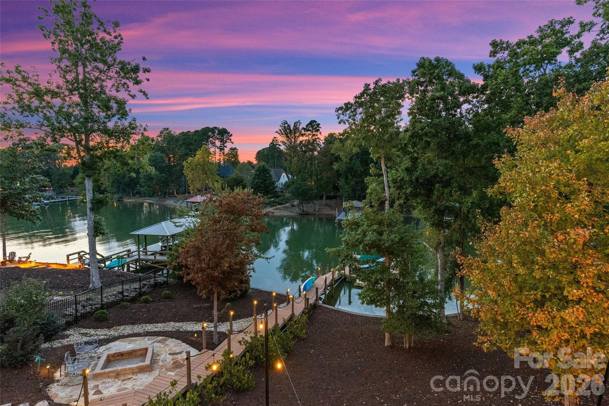 Outdoor fire pit, boardwalk & dock with stunning sunset views. - 6032 Headlands Court, Belmont