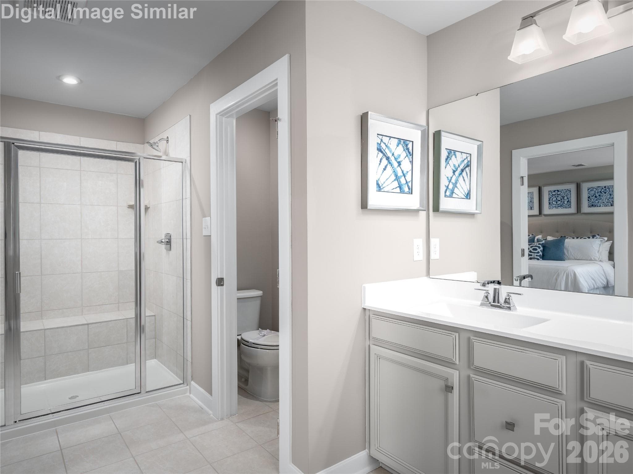 Designed for comfort — dual sinks, a private water closet, and a spacious walk-in shower for your daily living. - Charlotte