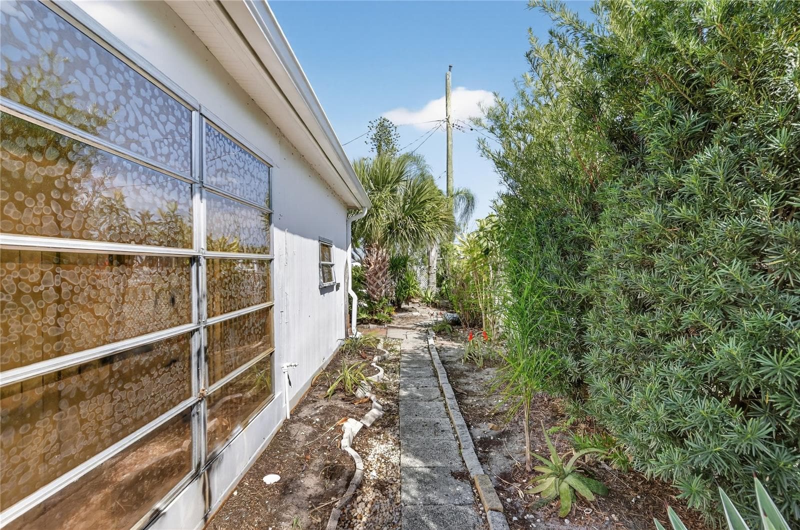 Side of Subject Property - 1349 SEAGULL DR, ENGLEWOOD