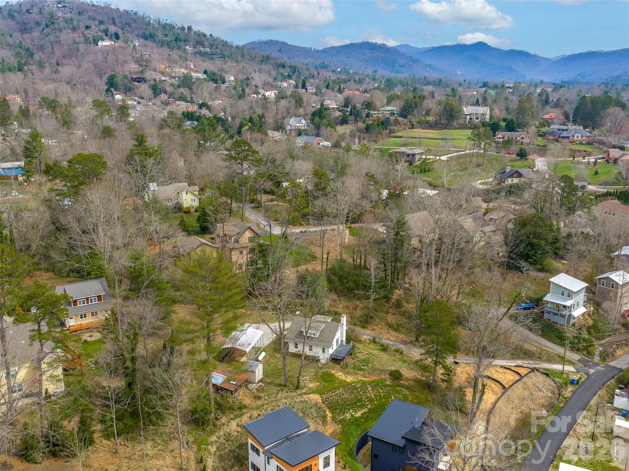 Possibility of mountain views from home built at 9 Woodbine Road. - Asheville