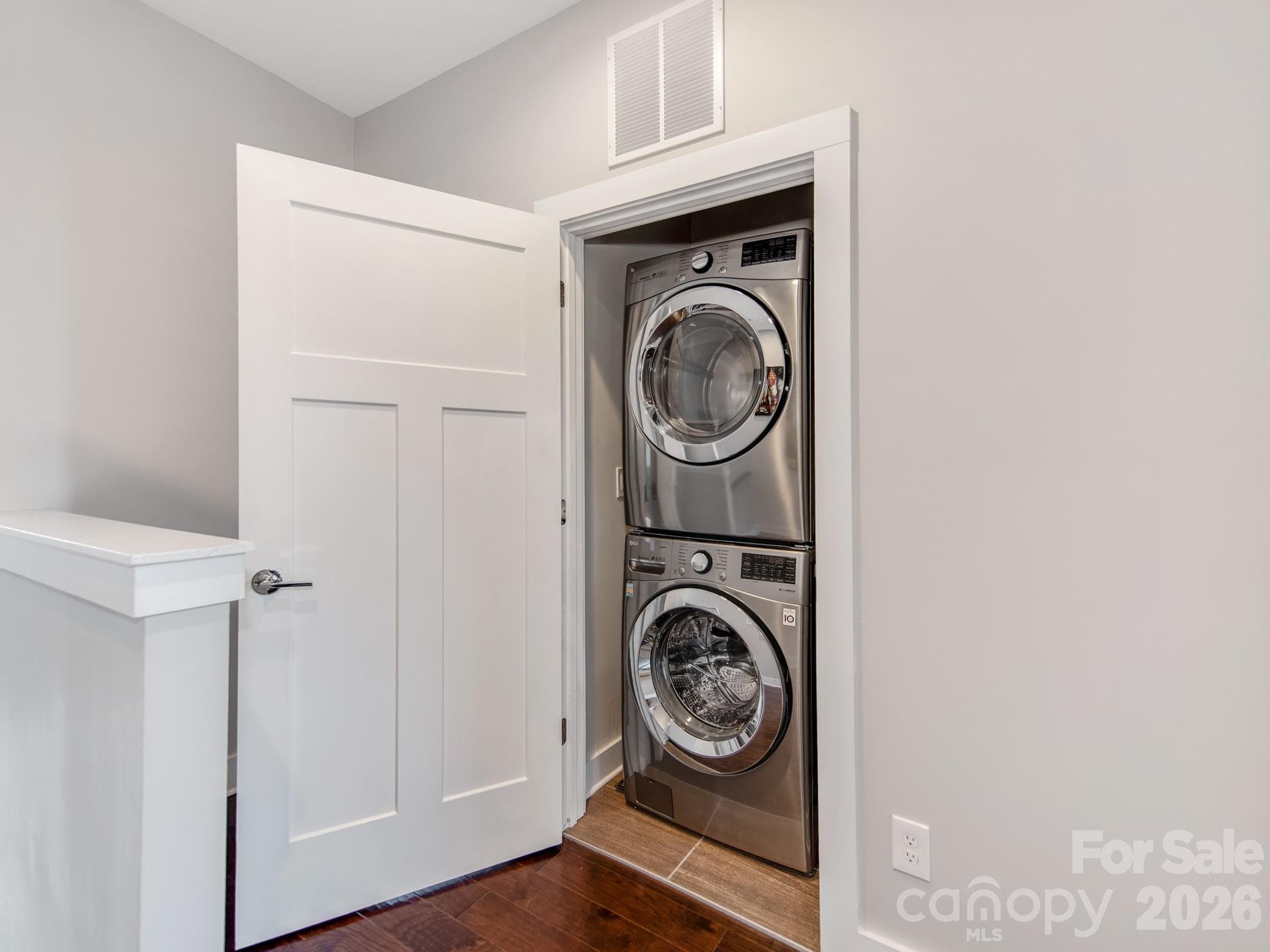 Laundry closet with front load washer and dryer. - 436 Southend Crossing Lane, Charlotte