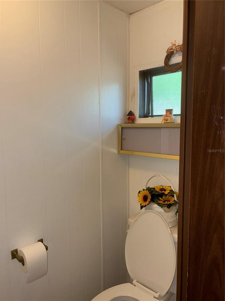 Half bath in the second bedroom. - 24533 PINK PANTHER RD, PAISLEY