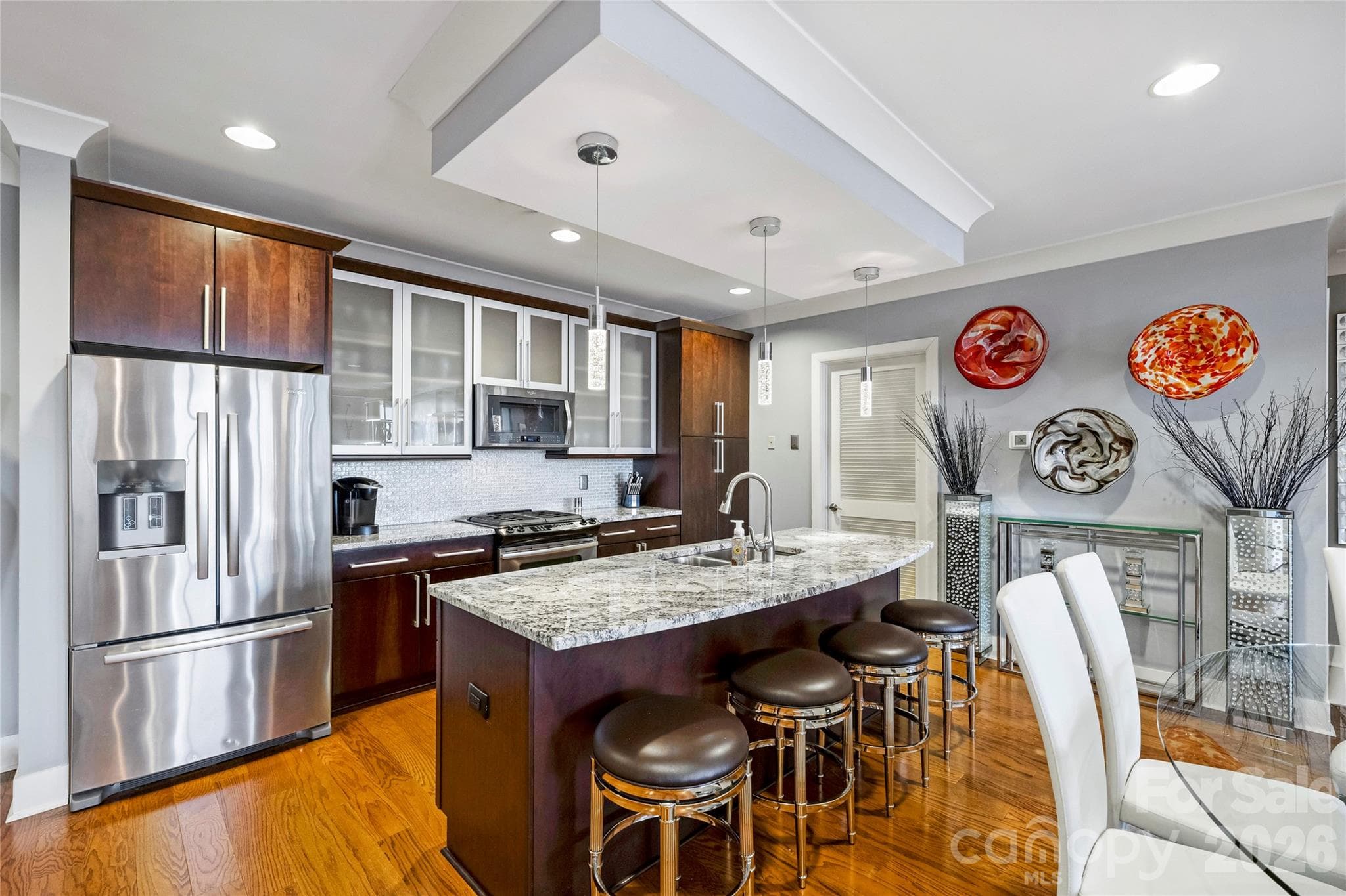 Upgraded kitchen with gas cooking, stainless professional series appliances, and soft-close cabinetry - 222 S Caldwell Street, Charlotte