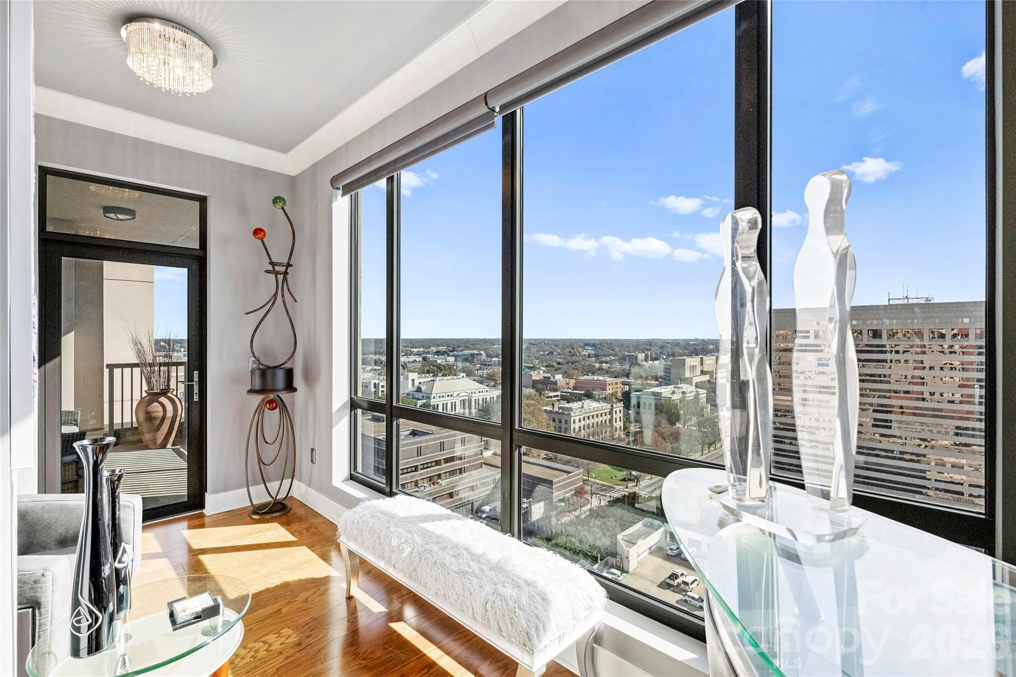 Expansive windows overlooking Marshall Park and surrounding Uptown skyline - 222 S Caldwell Street, Charlotte