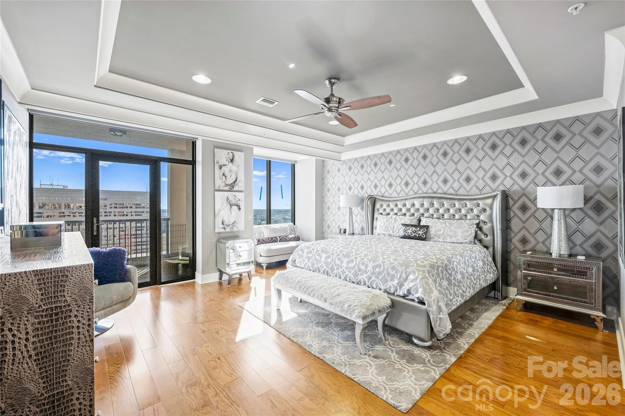 Primary bedroom with tray ceiling and terrace access - 222 S Caldwell Street, Charlotte