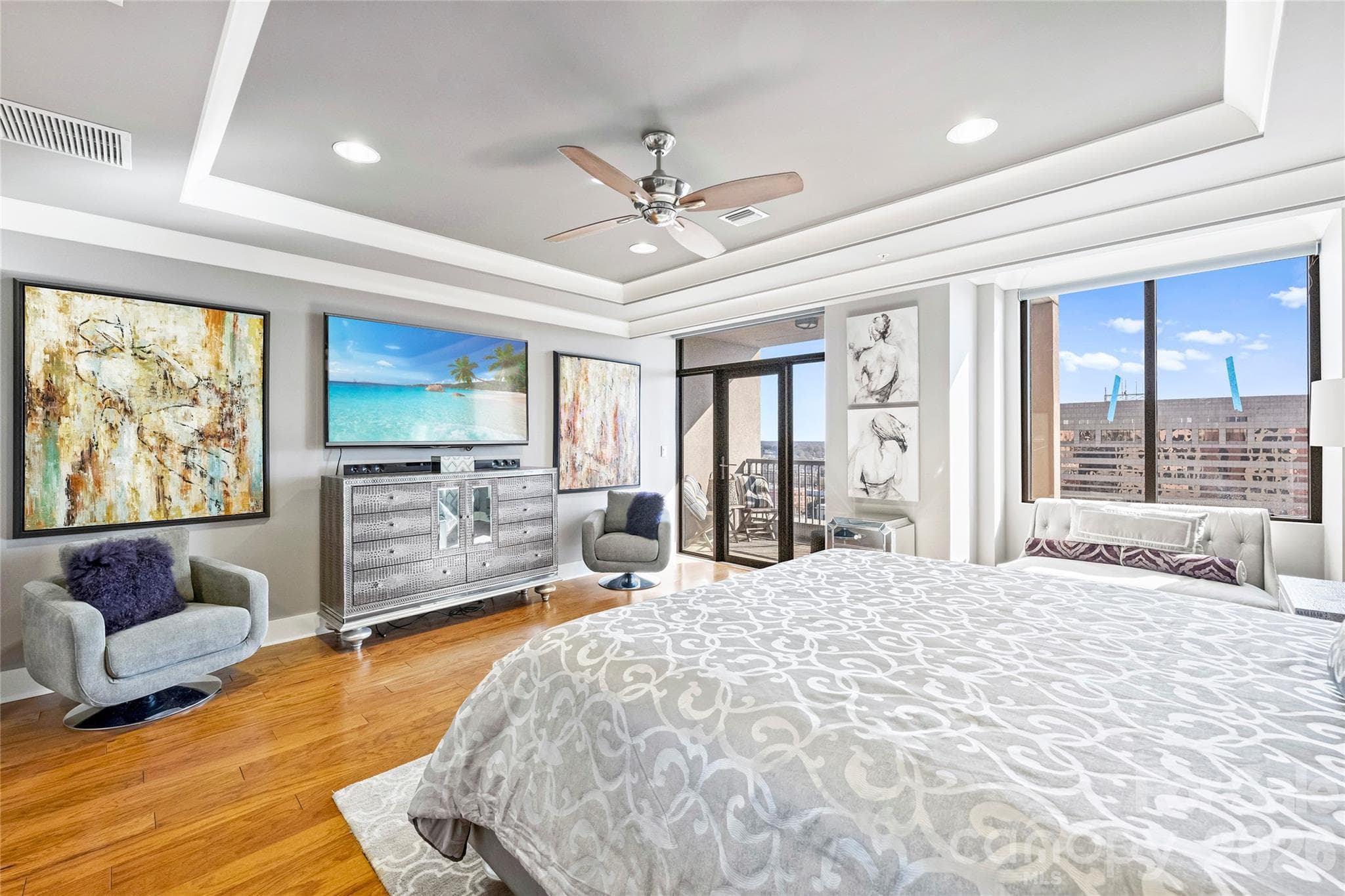 Primary bedroom with tray ceiling and terrace access - 222 S Caldwell Street, Charlotte