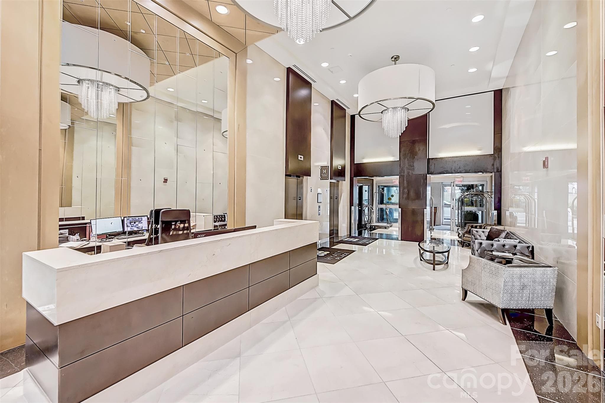 Lobby/concierge desk. - 222 S Caldwell Street, Charlotte