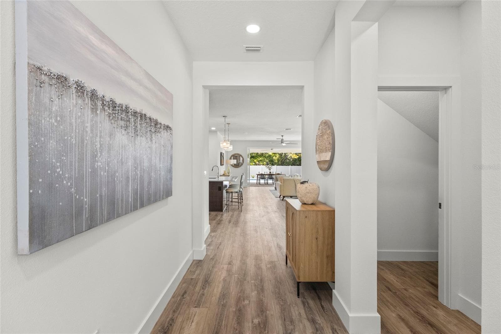 Entry Foyer/ to the right under stair closet /storage - 217 S SHADE AVE, SARASOTA