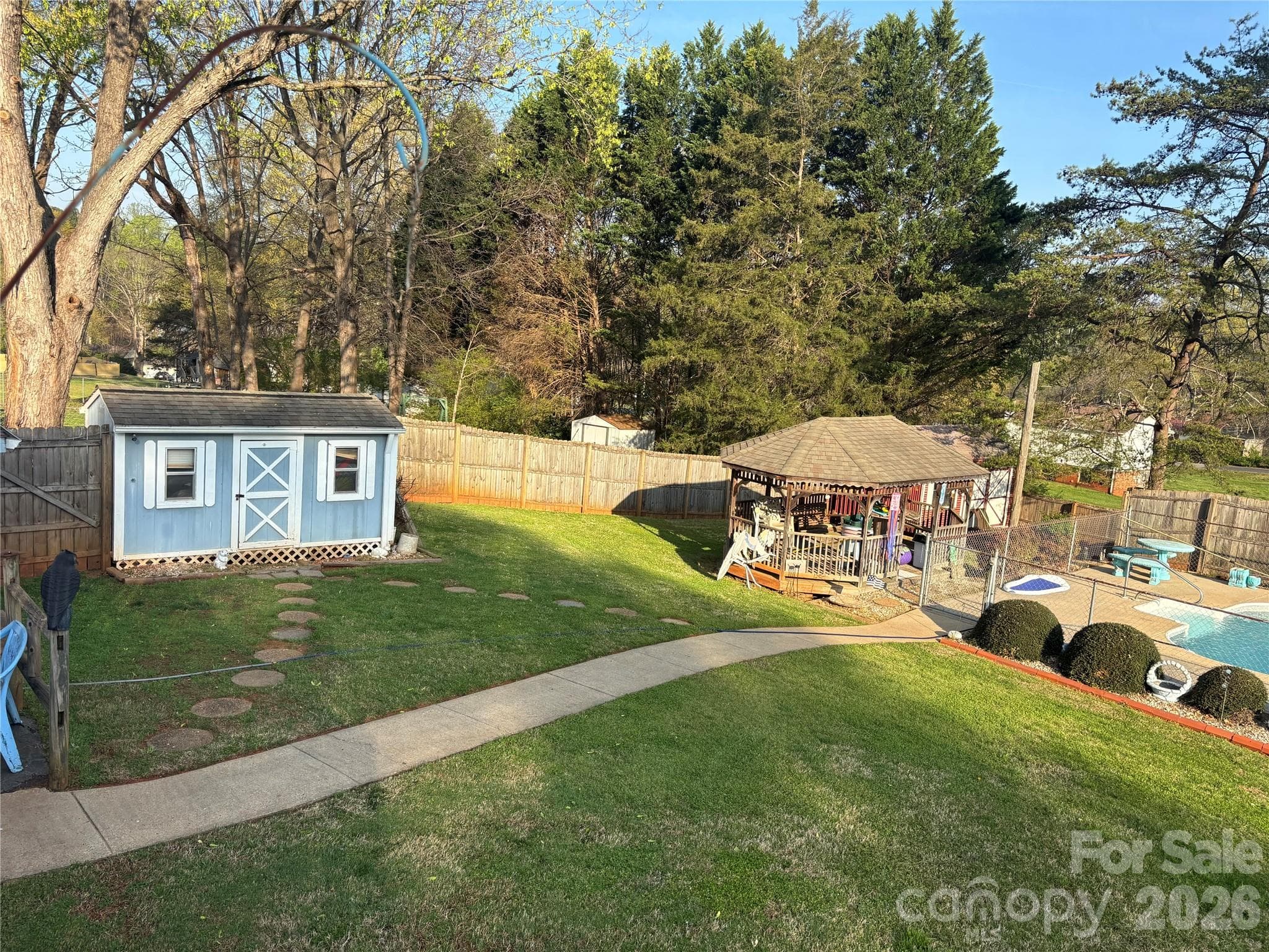 fenced in for privacy, a separate bathroom for pool company and shaded entertaining too - Newton