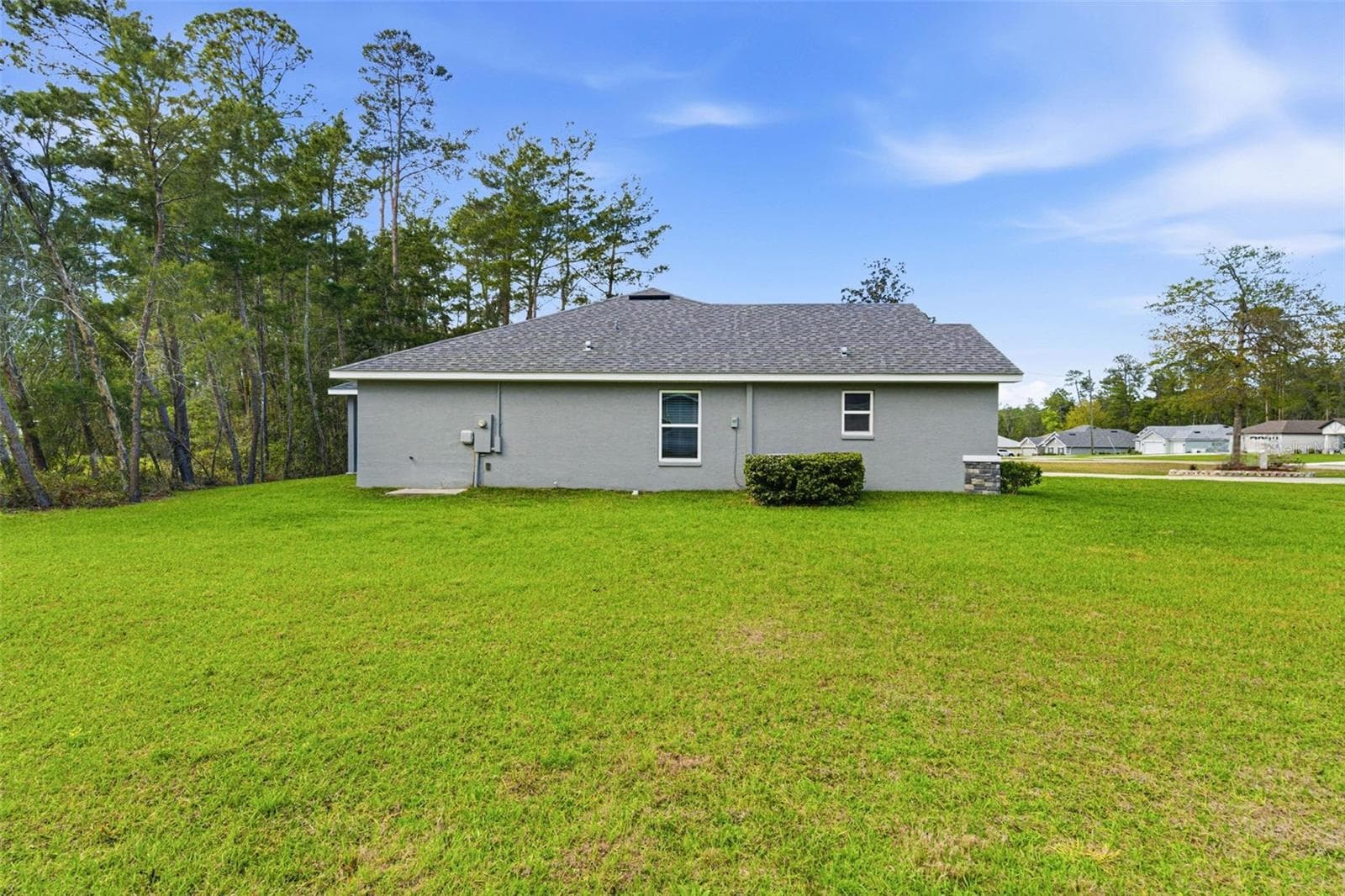 Side Property View - 47 VILLAGE CENTER DR, HOMOSASSA