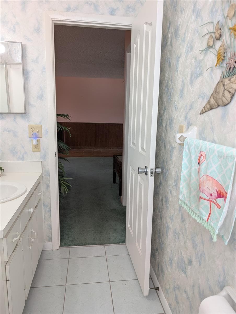 View from tub to living area. - 9204 36TH WAY N #6, PINELLAS PARK