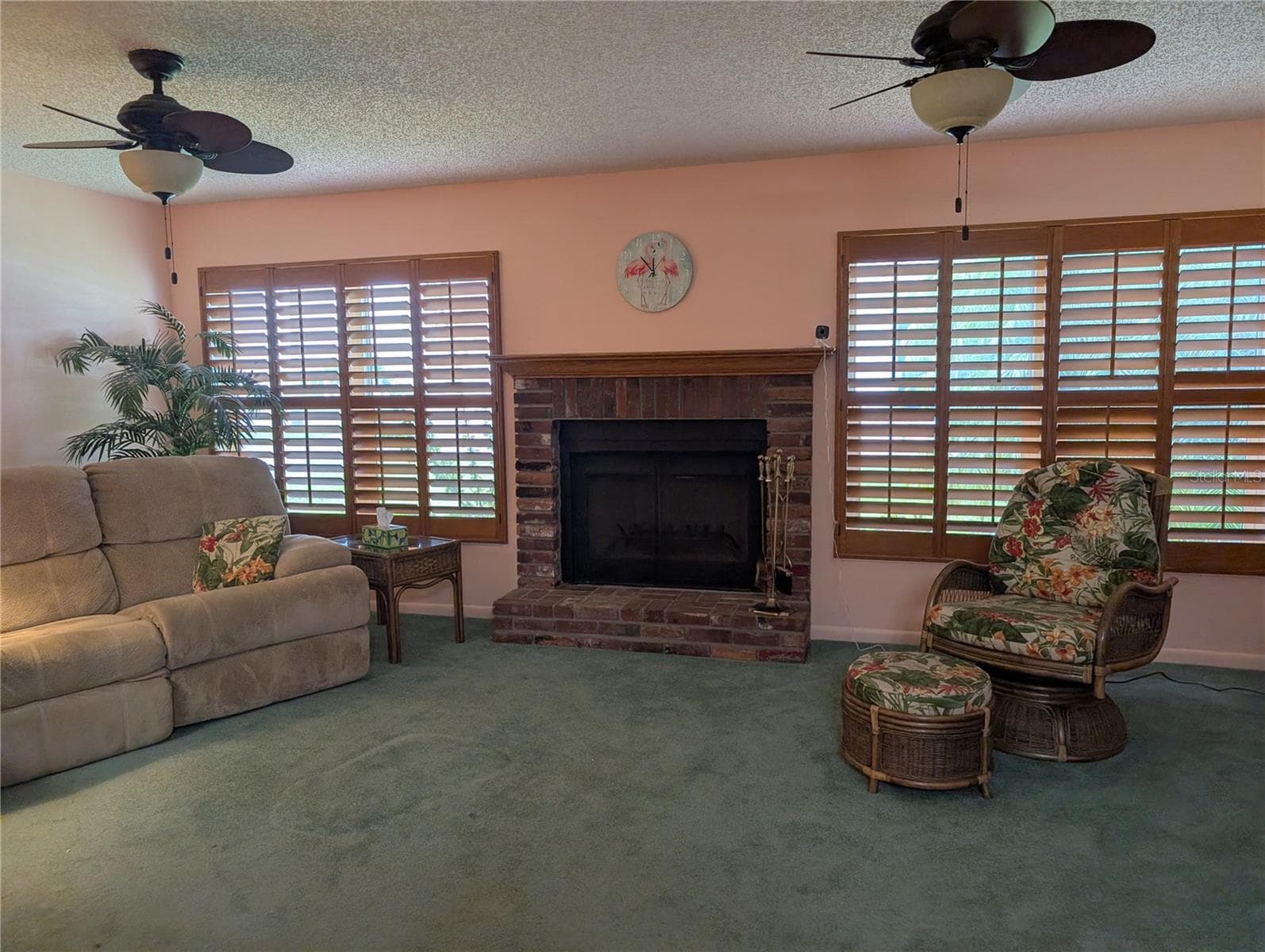 View of both windows.  Features also include the tropical fans and Honey oak plantation shutters. - 9204 36TH WAY N #6, PINELLAS PARK
