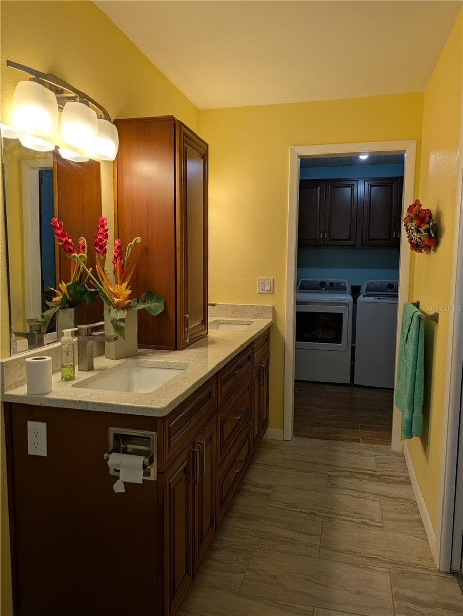 View from shower to interior laundry room. - 9204 36TH WAY N #6, PINELLAS PARK