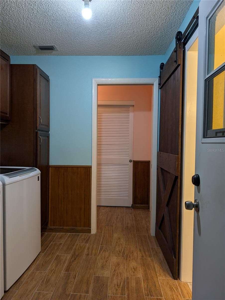 View from garage to hallway. - 9204 36TH WAY N #6, PINELLAS PARK
