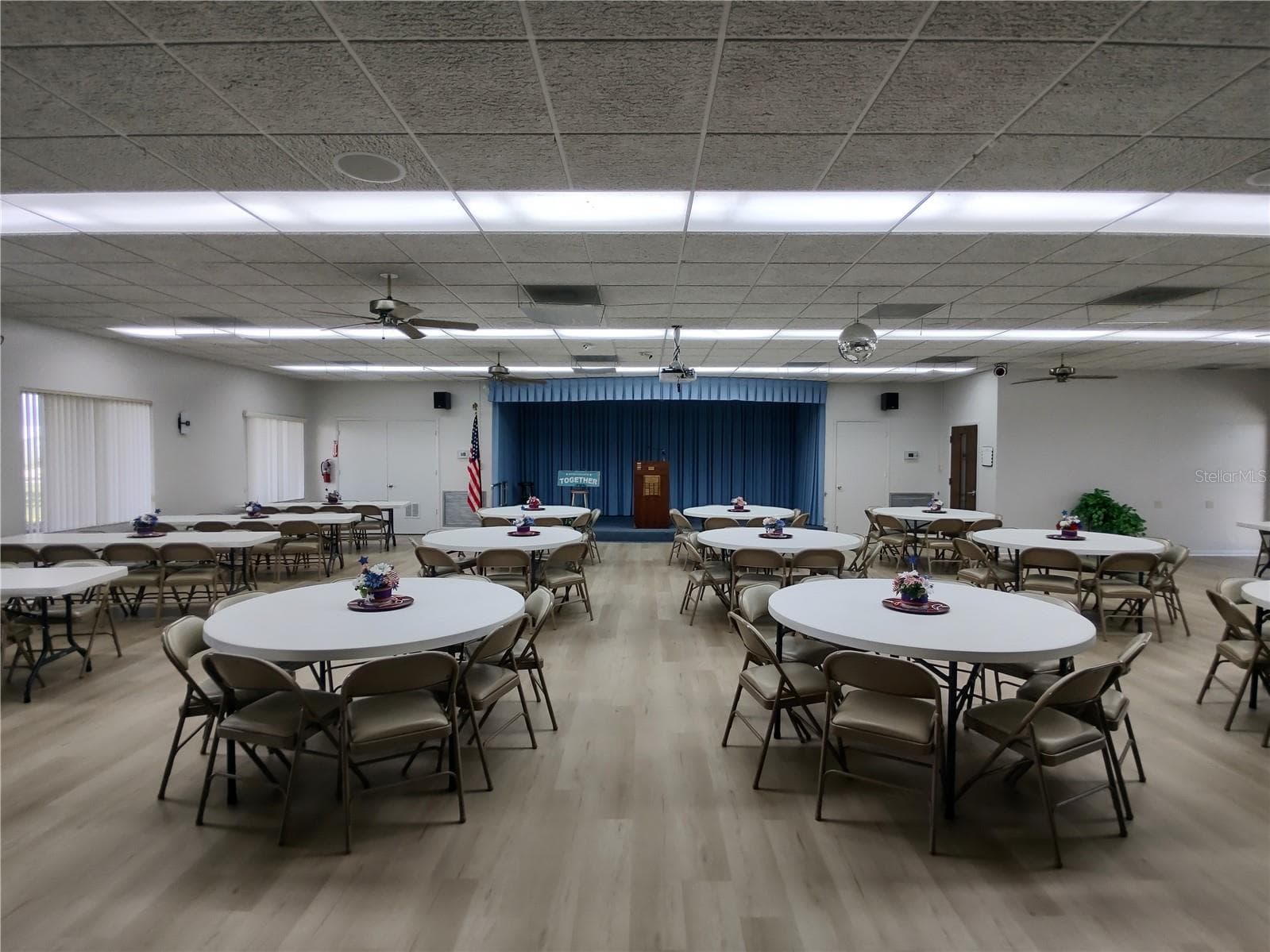 Community meeting room.  Business office to right of stage. - 9204 36TH WAY N #6, PINELLAS PARK