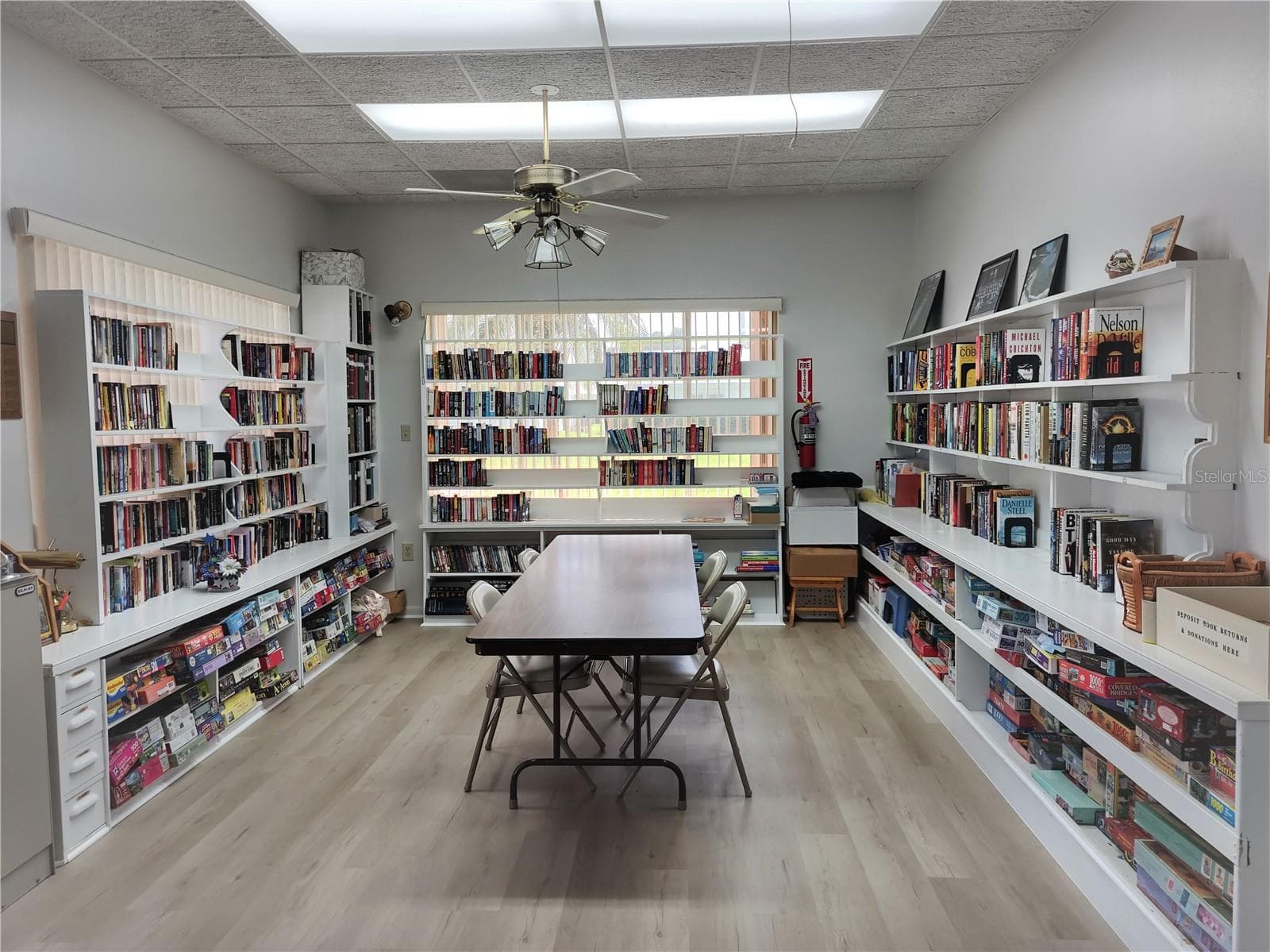 Library is on the honor system.  Book, puzzles and DVD's to take home and return when finished. - 9204 36TH WAY N #6, PINELLAS PARK