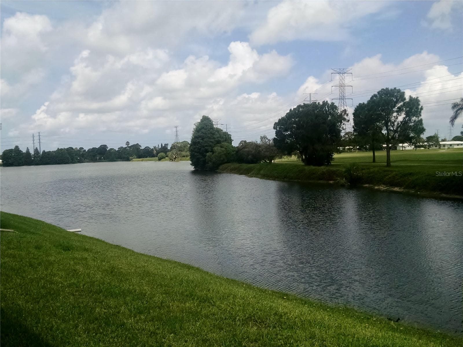 Nature lovers will enjoy the various water features...golfers not as much! This is the north lake in unit#6 across from the Golf course. - 9204 36TH WAY N #6, PINELLAS PARK