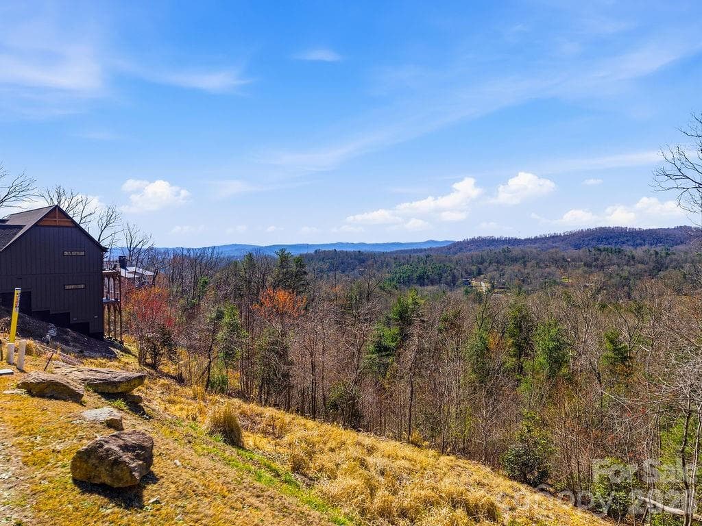 Experience long-range, year-round mountain views from this exceptional .90-acre homesite - 367 Curtain Bluff, Hendersonville
