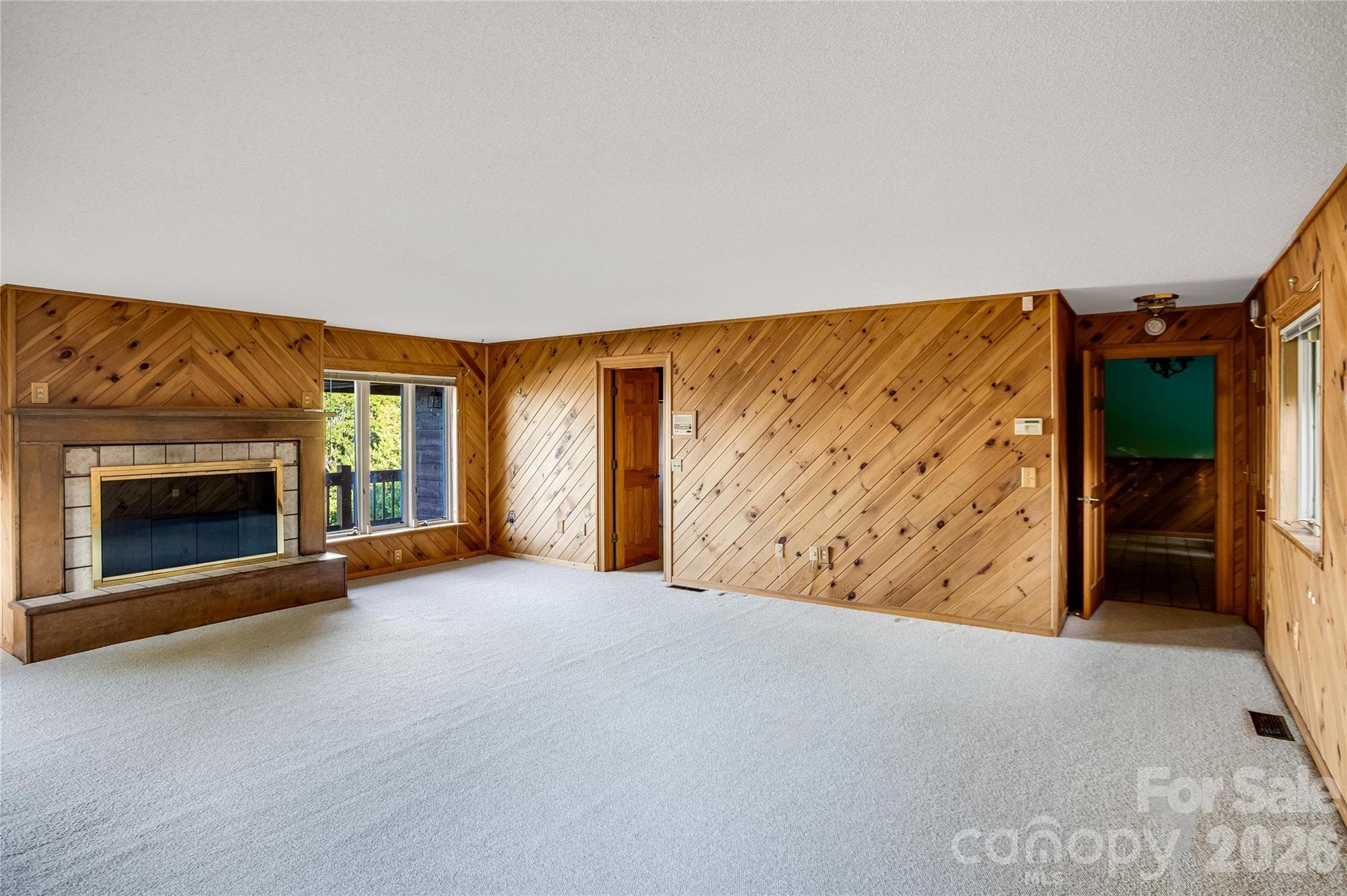 Spacious primary with fireplace and views - Clyde