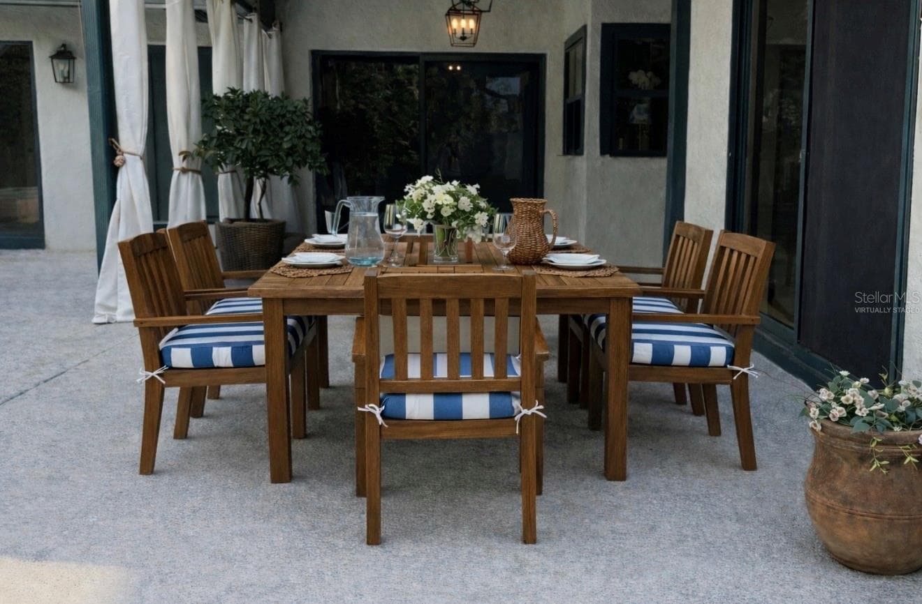 PATIO: VIRTUALLY STAGED PHOTO - 9115 BAY SIDE CT, ORLANDO