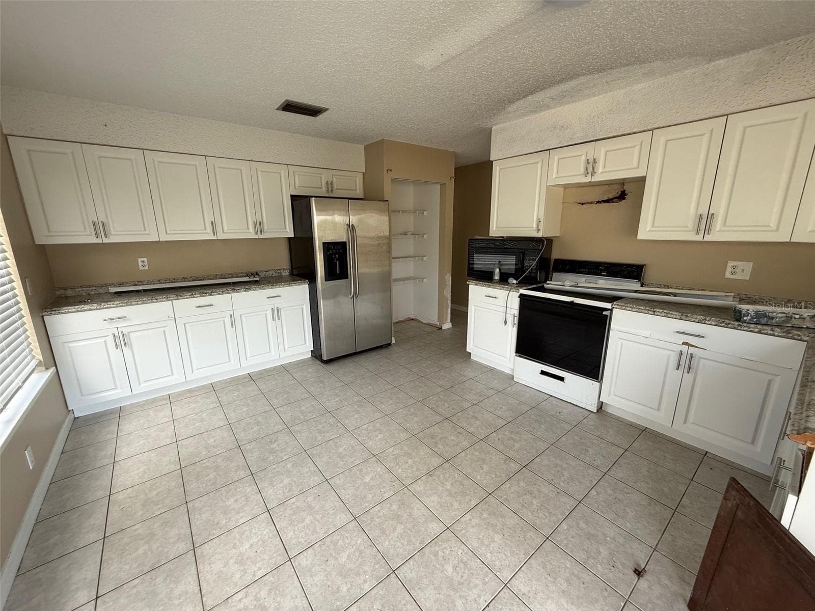 Single Family Residence at 9085 HEATHER BLVD, WEEKI WACHEE, photo 5 of 15