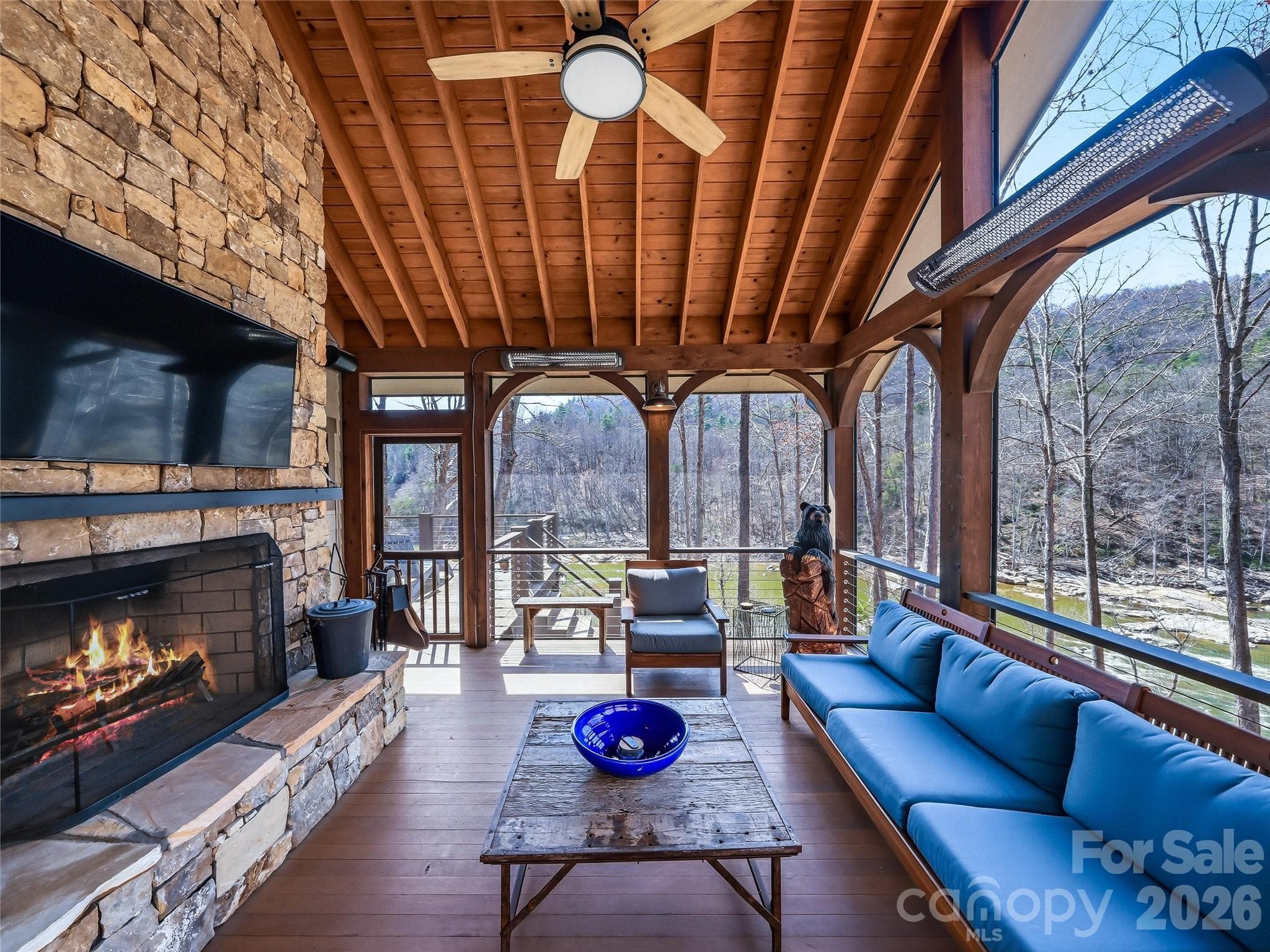 Beautiful screened porch with a wood burning fireplace and new heaters. Enjoy these views year round! - 3735 French Broad Parkway, Marshall