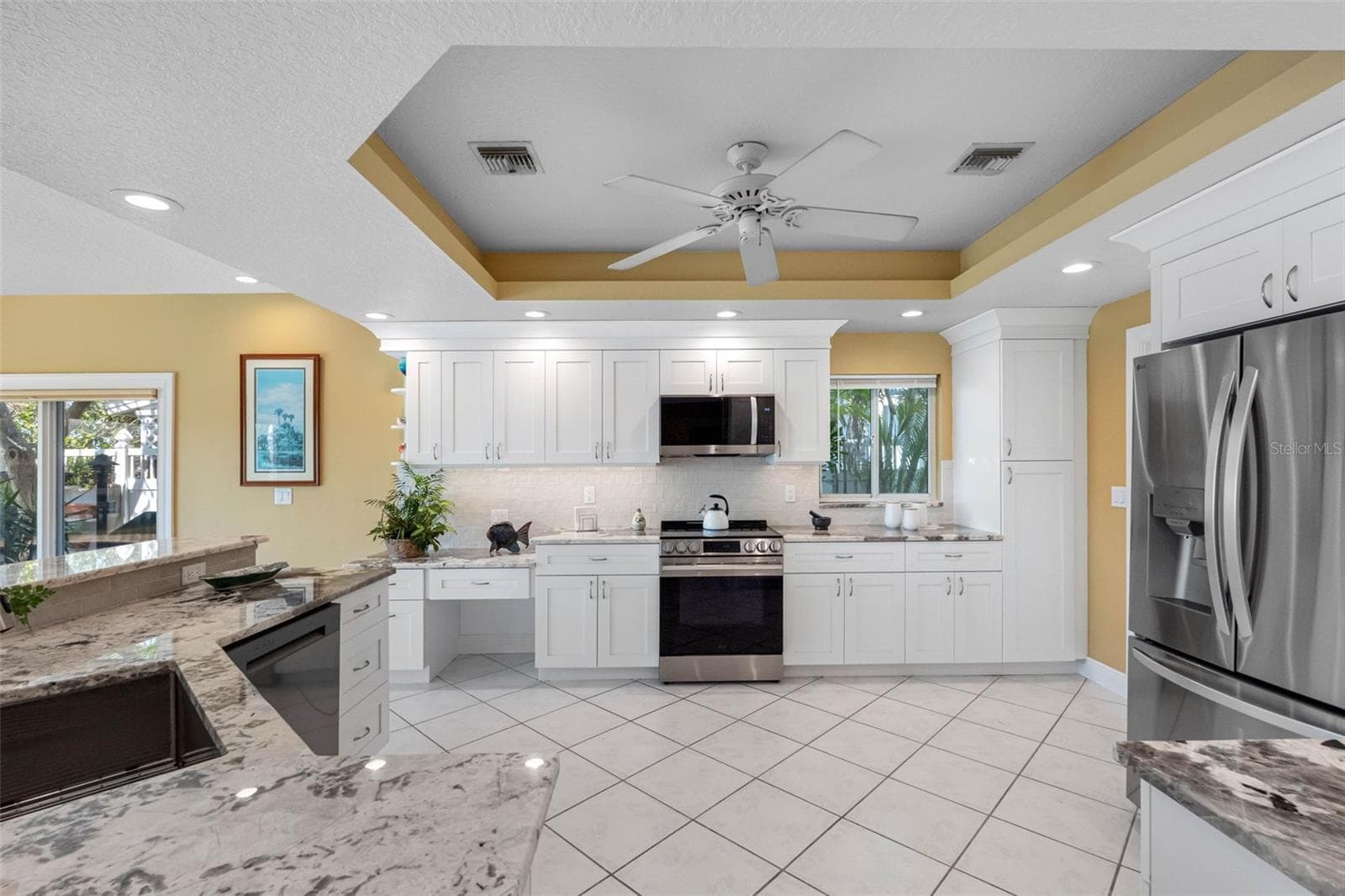 Recently renovated kitchen with all new stainless steel appliances, new cabinets and counters. - 11260 5TH ST E, TREASURE ISLAND