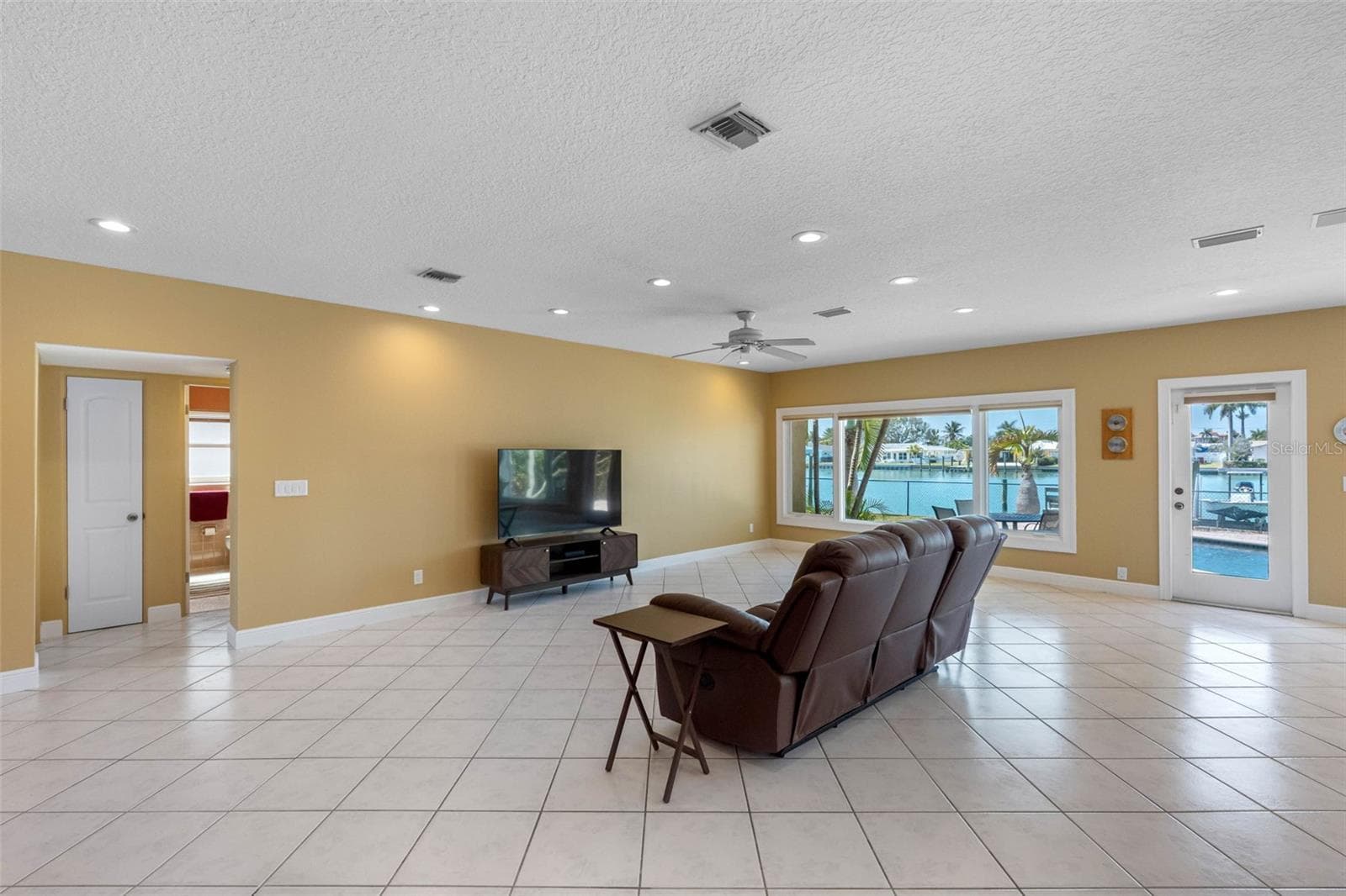 Two bedrooms are located on the first floor. - 11260 5TH ST E, TREASURE ISLAND