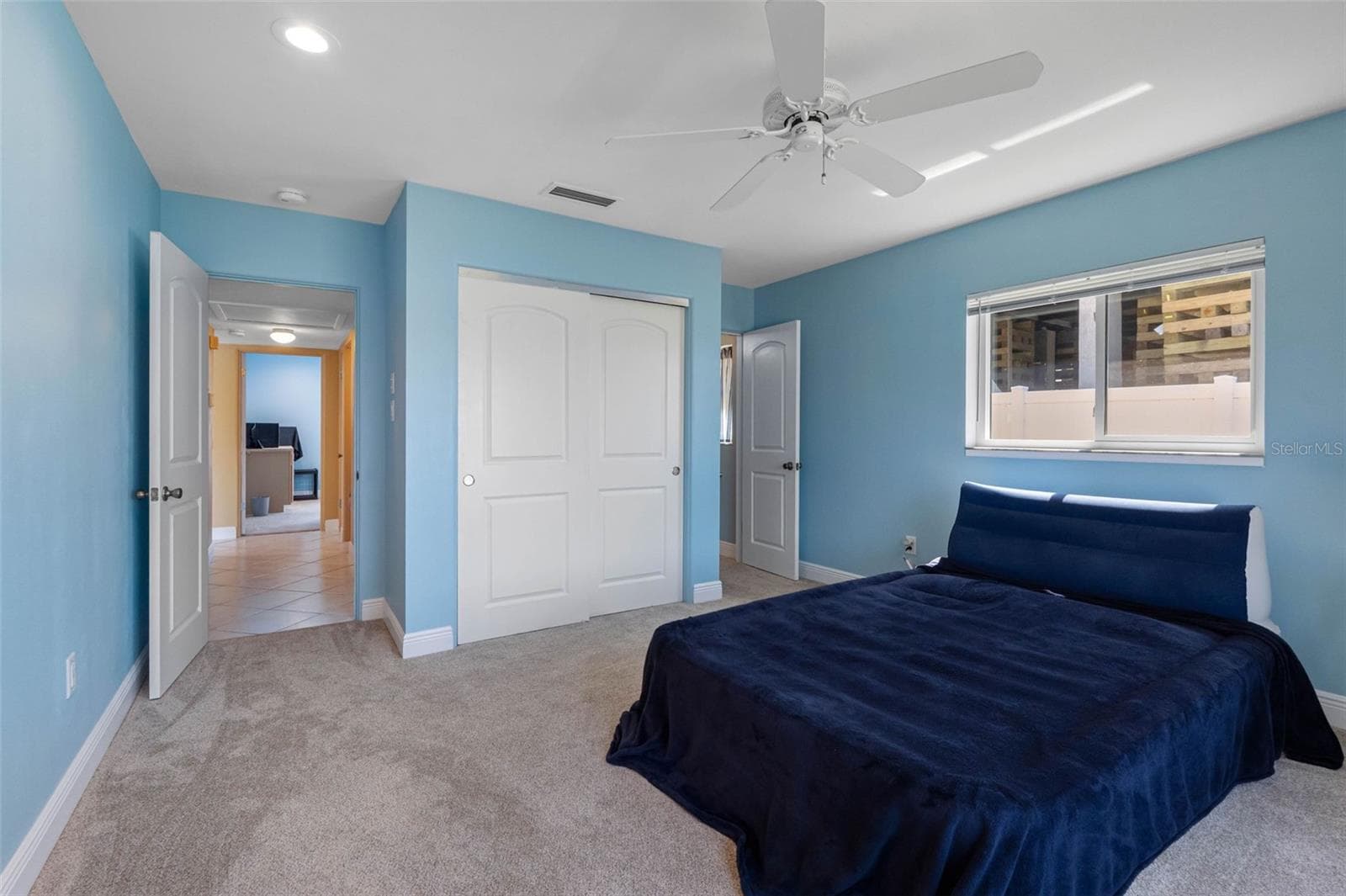 Bedroom has ensuite bathroom. - 11260 5TH ST E, TREASURE ISLAND