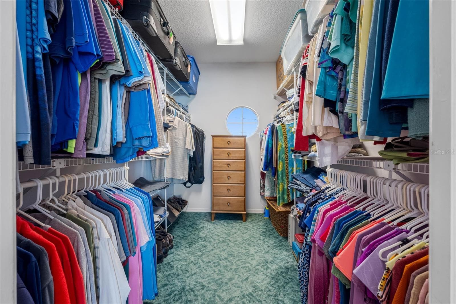 Walk-in closet. - 11260 5TH ST E, TREASURE ISLAND