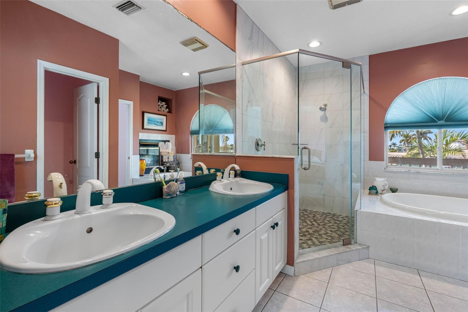Double sinks and walk-in shower. - 11260 5TH ST E, TREASURE ISLAND