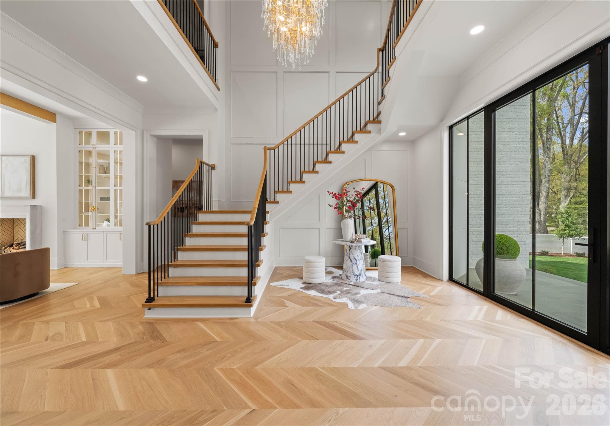 Two story foyer with motion light up stairs - Charlotte
