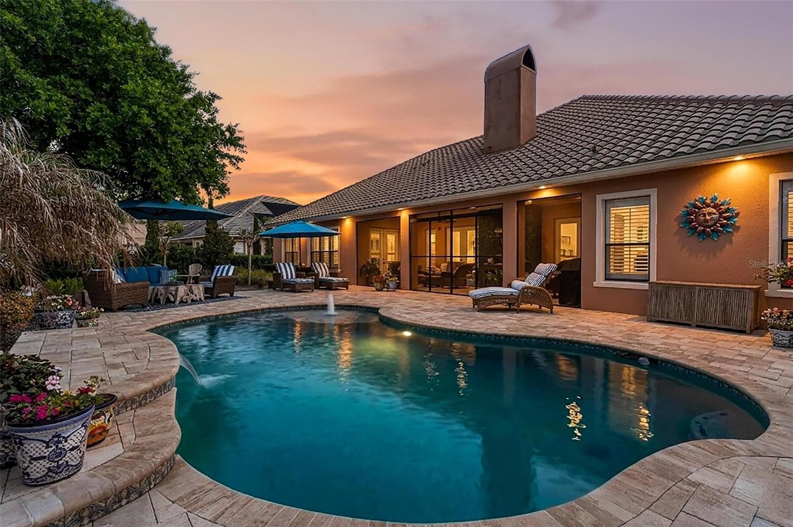 REAR NIGHT SHOT - 3001 ISOLA BELLA BLVD, MOUNT DORA